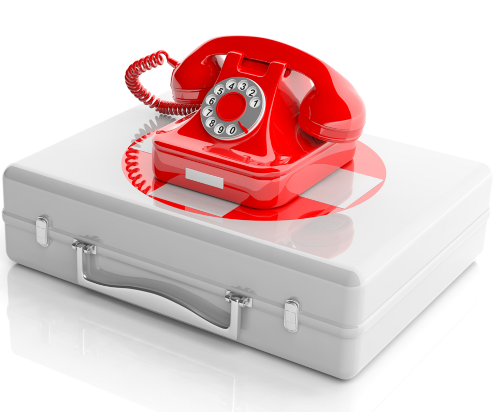 Rotes Telefon mit Wählscheibe auf einem Erste Hilfe Koffer